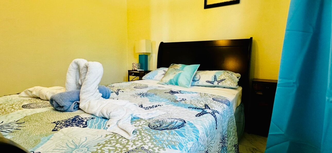 Cozy Tobago beachfront accommodation with ocean views and tropical decor at Seaview Escape Tobago.